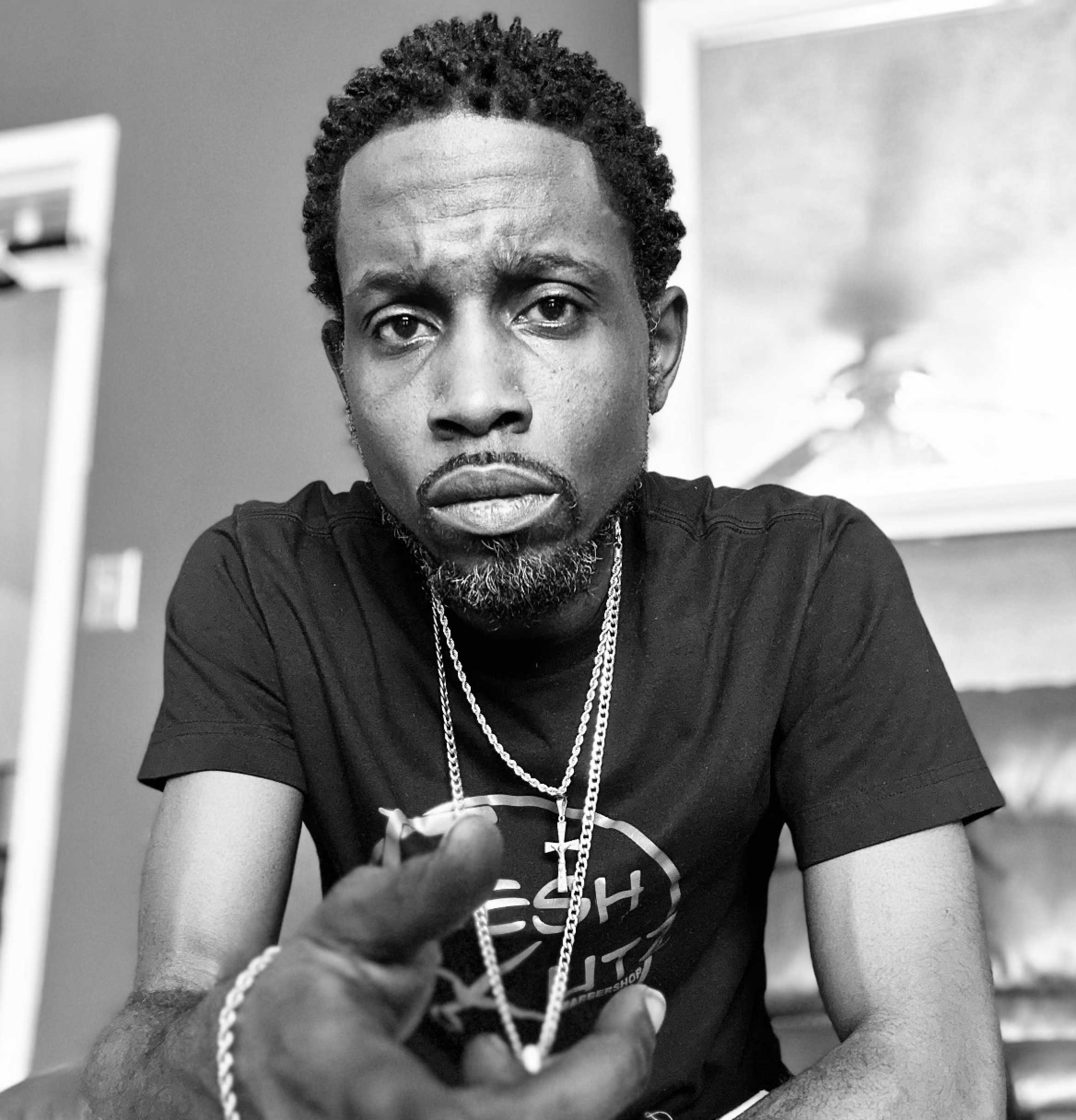 Manyell Burden, owner and barber